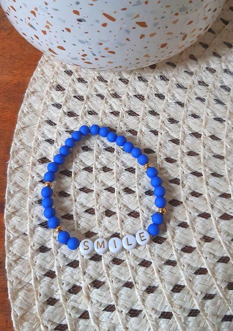 Bracelet élastique bleu SMILE