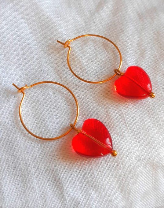 Créoles en acier dorées Cupidon