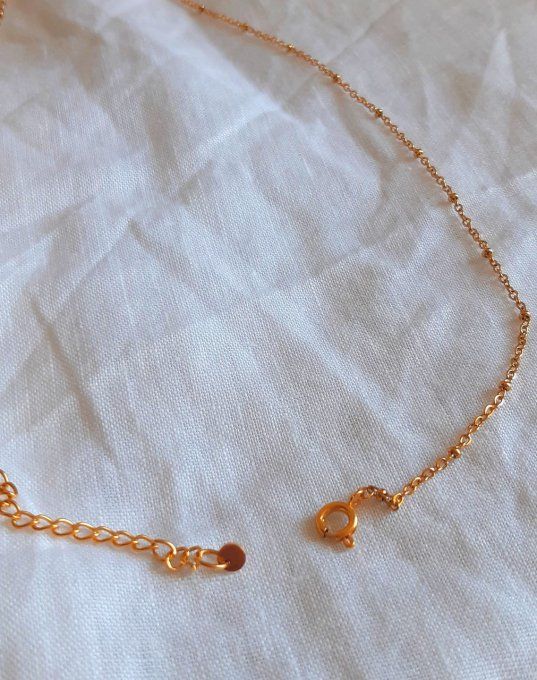 Collier acier doré Pâquerette