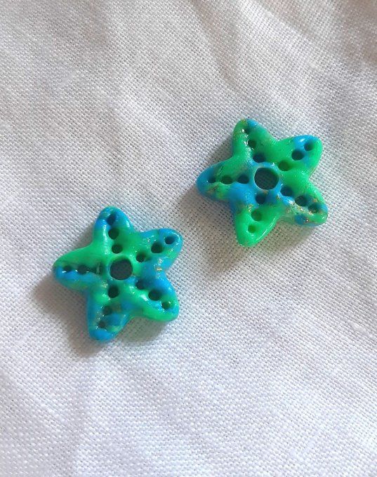 Étoiles de mer en pâte fimo bleues/dorées